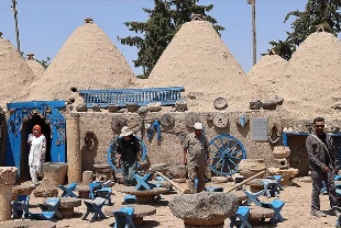 Harran'ın kubbeli evleri mimarisiyle kavurucu sıcakta serinlik yaşatıyor