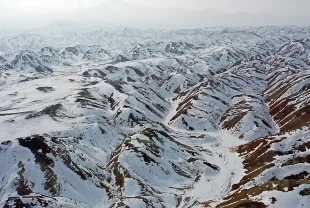 Iğdır'da kar Gökkuşağı Tepeleri'ni beyaza bürüdü