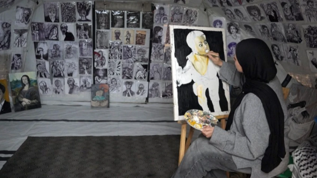 Gazzeli ressam Zaanin, İsrail saldırılarının bıraktığı yıkımı ve kaybolan hayalleri tuvale yansıtıyor Gazzeli ressam Zaanin, İsrail saldırılarının bıraktığı yıkımı ve kaybolan hayalleri tuvale yansıtıyor